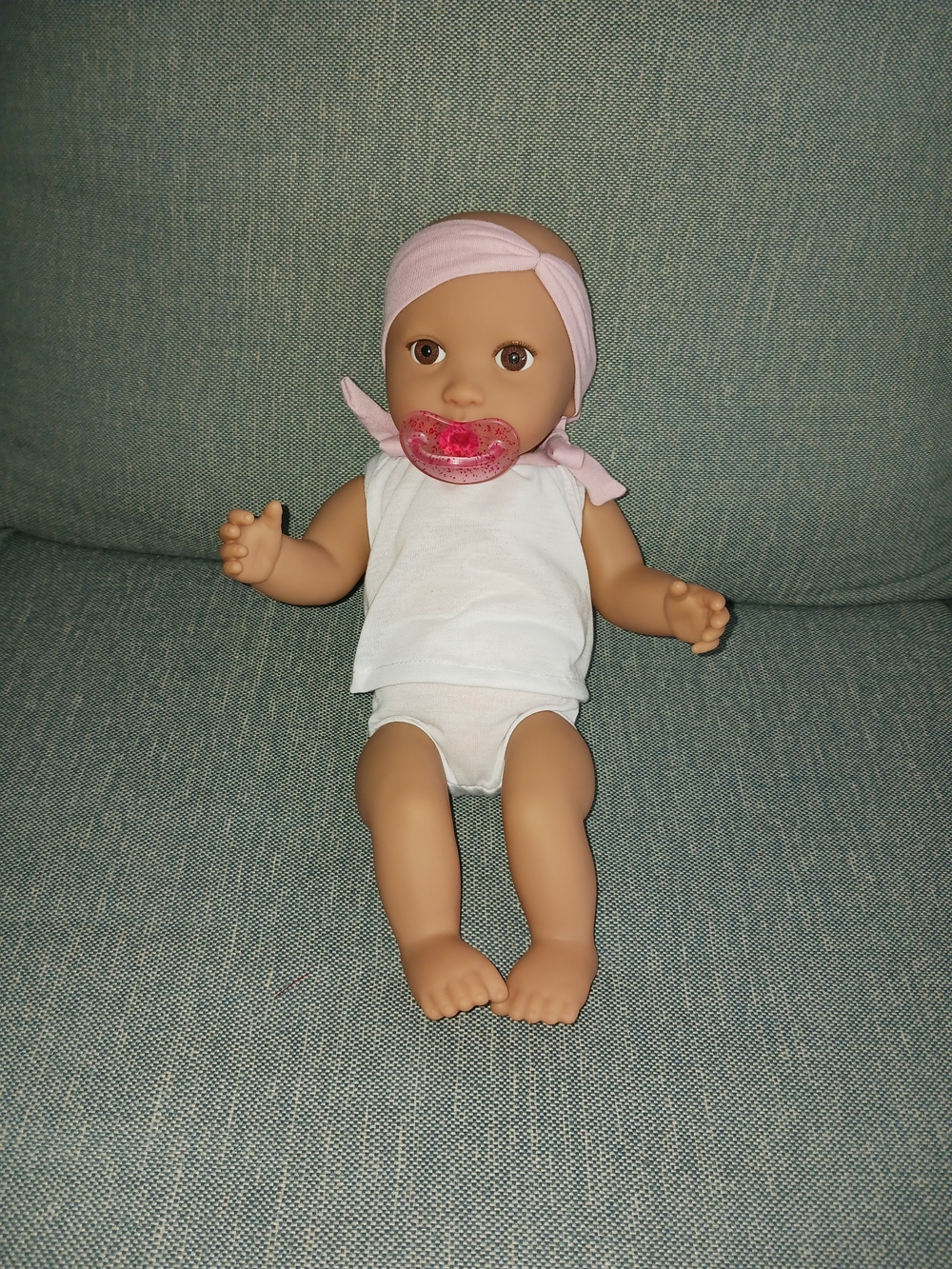 Soft Body Baby Doll with Pink Headband and Pacifier Brown Eyes Tan Skin